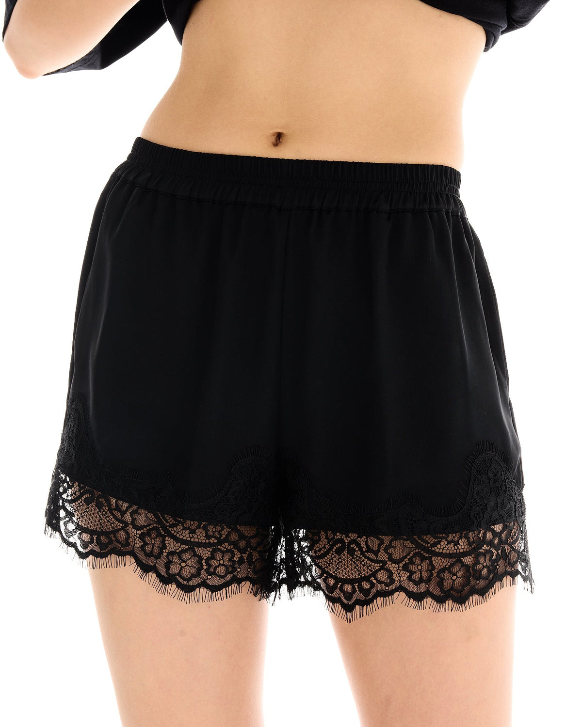 The Tales Lace Athena Shorts in Black, elastic waist detail